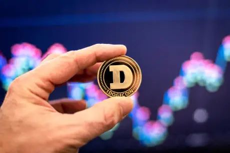 Dogecoin alcanza fondo perfecto y se perfila una subida a $1.6: análisis de Cryptollica