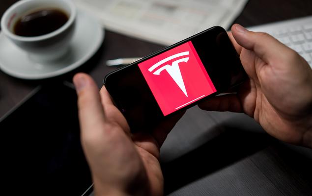 ETFs in Spotlight as Tesla Tops Q4 Earnings, Dips on Revenue Miss