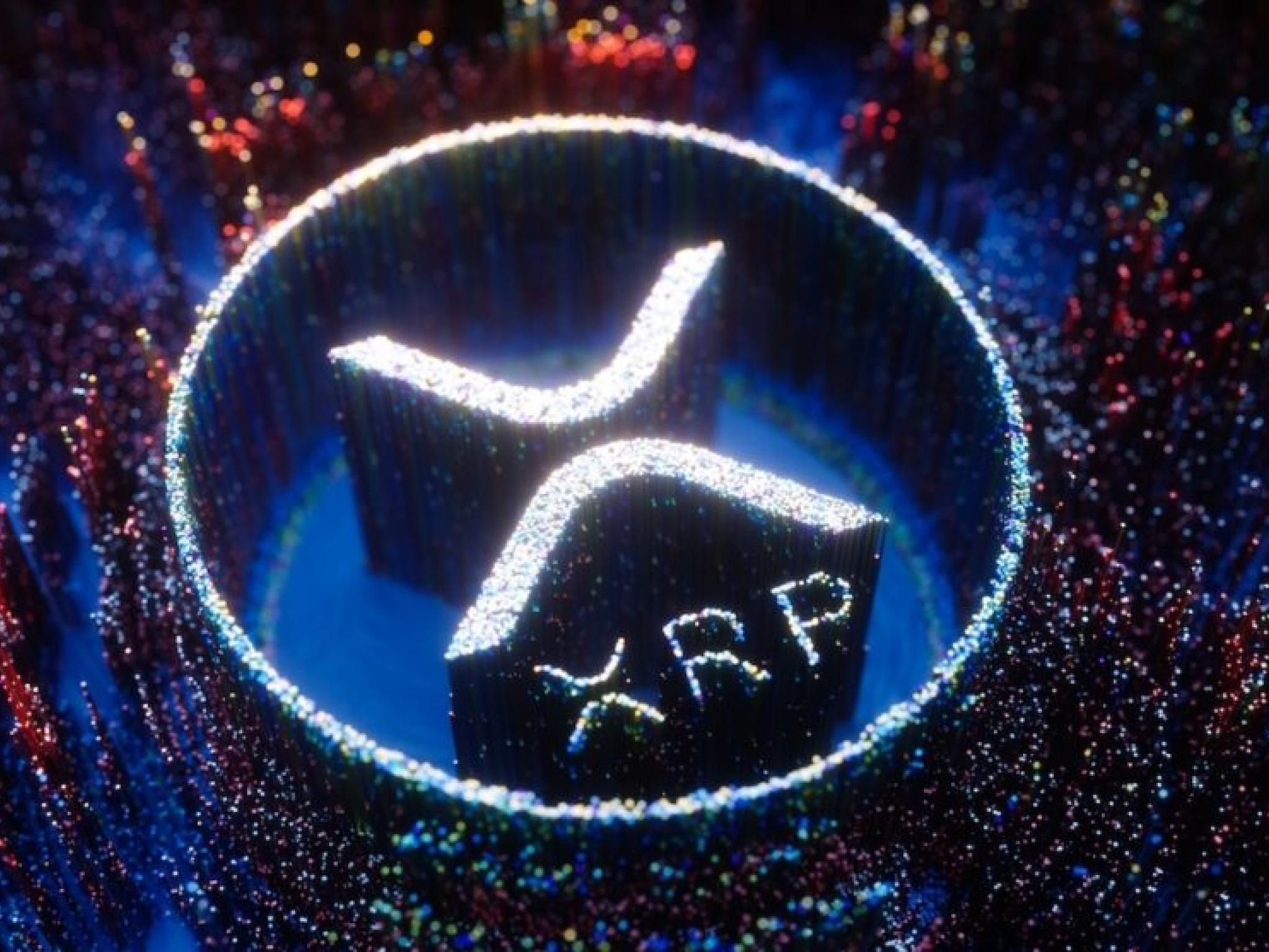 Frénésie de l'ETF XRP : 14 millions de dollars de volumes précoces alors que Franklin ajoute XRPZ à la course | Benzinga France